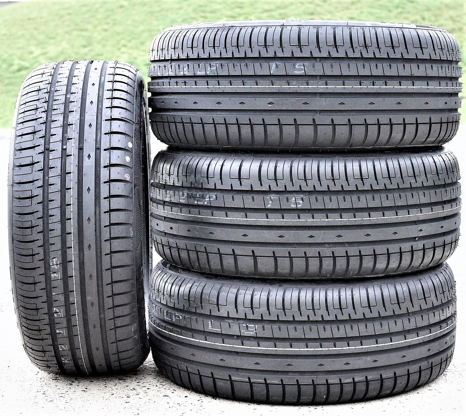 A pair of 2(2) 225/40R20 101W XL AS A/S performance tires